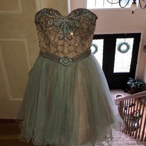 gorgeous embezzled teal and gold prom dress